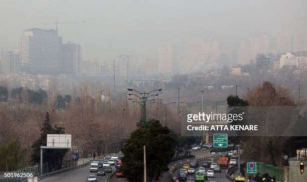 General view taken from the west of Tehran shows the heavily polluted skyline of the Iranian capital on December 19, 2015. Air quality in Iran's...