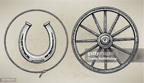 cowboy wagon wheel, horseshoe und lasso - horseshoe stock-grafiken, -clipart, -cartoons und -symbole