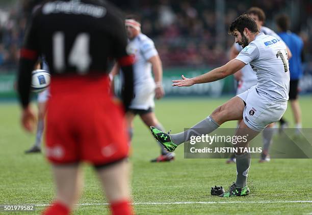 Oyonnax's fly-half from France Regis Lespinas kicks a penalty during the European Rugby Champions Cup rugby union match between Saracens and Oyonnax...