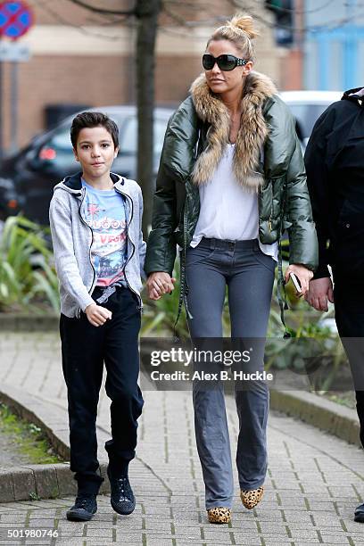 Katie Price arrives at the New Victoria Theatre with son Junior on December 19, 2015 in Woking, England.