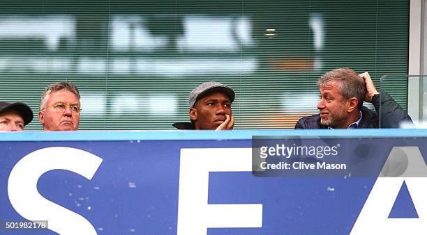 Chelsea interim manager Guus Hiddink , Didier Drogba of Montreal Impact and Chelsea owner Roman Abramovich are seen on the stand during the Barclays...