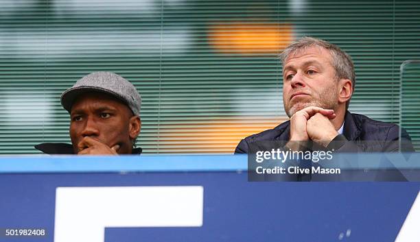 Didier Drogba of Montreal Impact and Chelsea owner Roman Abramovich are seen on the stand during the Barclays Premier League match between Chelsea...