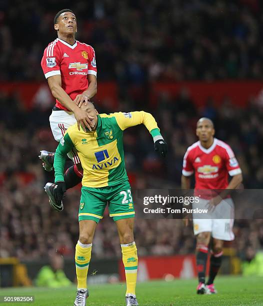 Anthony Martial of Manchester United in action with Martin Olsson of Norwich City during the Barclays Premier League match between Manchester United...