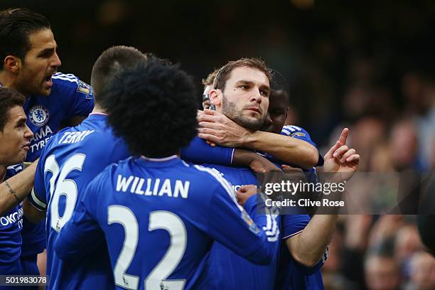 Branislav Ivanovic of Chelsea celebrates scoring his team's first goal with his team matesduring the Barclays Premier League match between Chelsea...