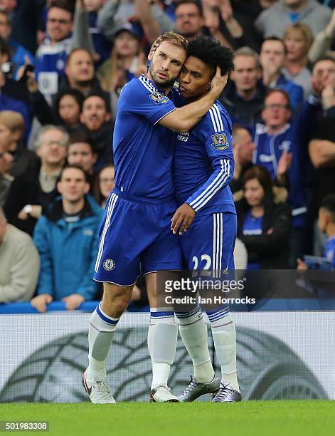 Branislav Ivanovic of Chelsea celebrates scoring the opening goal with team-mate Willian during the Barclays Premier League match between Chelsea and...