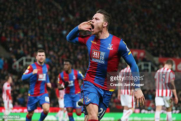 Connor Wickham of Crystal Palace celebrates scoring his team's first goal during the Barclays Premier League match between Stoke City and Crystal...