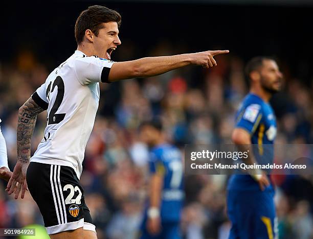 Santi Mina of Valencia celebrates scoring his team's second goal during the La Liga match between Valencia CF and Getafe CF at Estadi de Mestalla on...