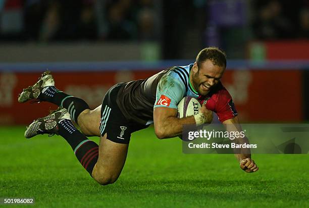 Jamie Roberts of Harlequins dives over to score a try on his Harlequins debut during the European Rugby Challenge Cup pool 3 match between Harlequins...