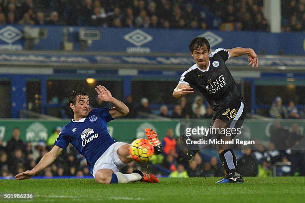 Shinji Okazaki of Leicester City scores his team's third goal during the Barclays Premier League match between Everton and Leicester City at Goodison...
