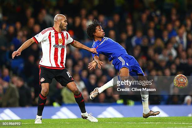 Loic Remy of Chelsea and Younes Kaboul of Sunderland compete for the ball during the Barclays Premier League match between Chelsea and Sunderland at...