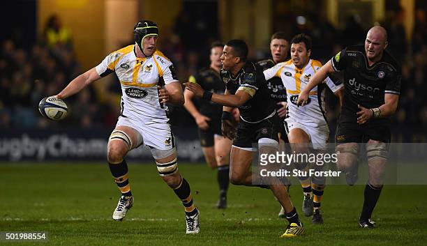 James Gaskell of Wasps escapes the clutches of Anthony Watson of Bath during the European Rugby Champions Cup match between Bath Rugby and Wasps at...