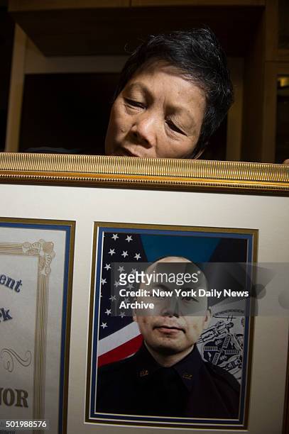 Xiu Yan Li talks about her son, NYPD detective Wenjian Liu, who was killed in the line of duty December 20, 2014. She's pictured at her home in...