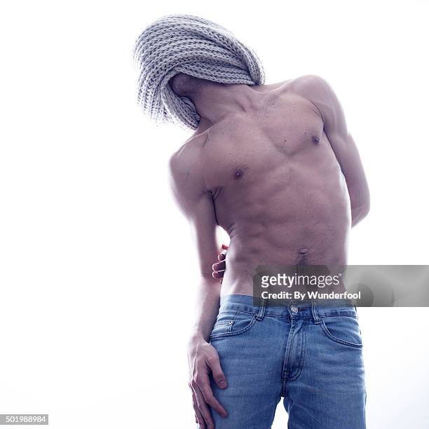 male ballet dancer posing against backlight - hairy back man stockfoto's en -beelden
