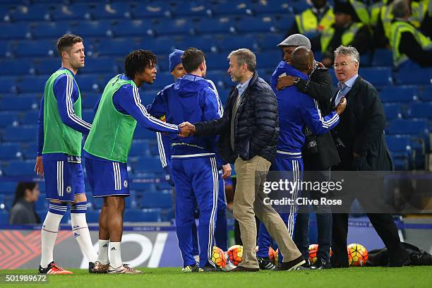 Chelsea owner Roman Abramovich , Chelsea interim manager Guus Hiddink and Didier Drogba of Montreal Impact congratulate players and staffs including...