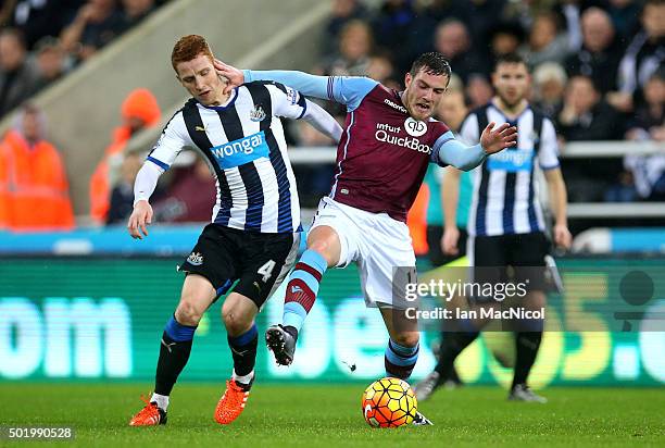 Jordan Veretout of Aston Villa and Jack Colback of Newcastle United compete for the ball during the Barclays Premier League match between Newcastle...