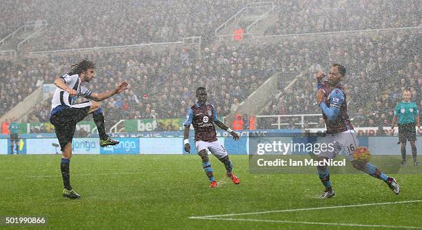 Fabricio Coloccini of Newcastle United scores his team's first goal during the Barclays Premier League match between Newcastle United and Aston Villa...