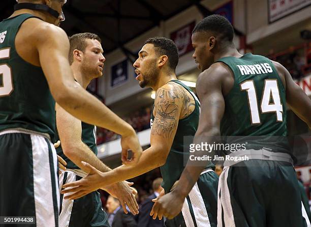Denzel Valentine of the Michigan State Spartans celebrates in the second half during a game with Northeastern Huskies on December 19, 2015 at the...