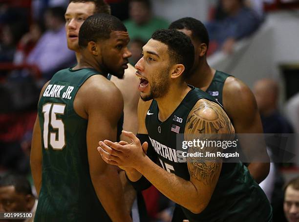 Denzel Valentine of the Michigan State Spartans celebrates in the second half during a game with Northeastern Huskies on December 19, 2015 at the...