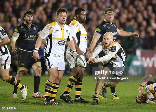 Joe Simpson of Wasps passes the ball during the European Rugby Champions Cup match between Bath and Wasps at the Recreation Ground on December 19,...