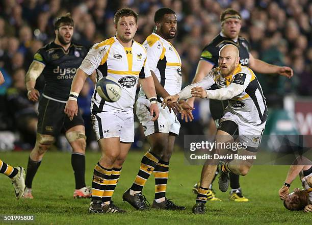 Joe Simpson of Wasps passes the ball during the European Rugby Champions Cup match between Bath and Wasps at the Recreation Ground on December 19,...