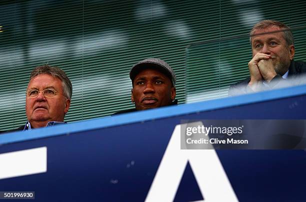 Chelsea interim manager Guus Hiddink , Didier Drogba of Montreal Impact and Chelsea owner Roman Abramovich are seen on the stand prior to the...