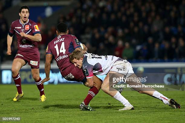 Metuisela Talebula for Union Bordeaux Begles is tackled by Ben John for Ospreys during the European Rugby Champions Cup match between Union Bordeaux...