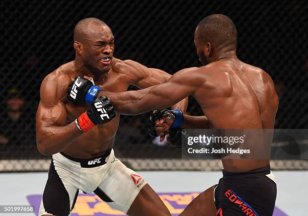 Leon Edwards punches Kamaru Usman in their welterweight bout during the UFC Fight Night event at the Amway Center on December 19, 2015 in Orlando,...