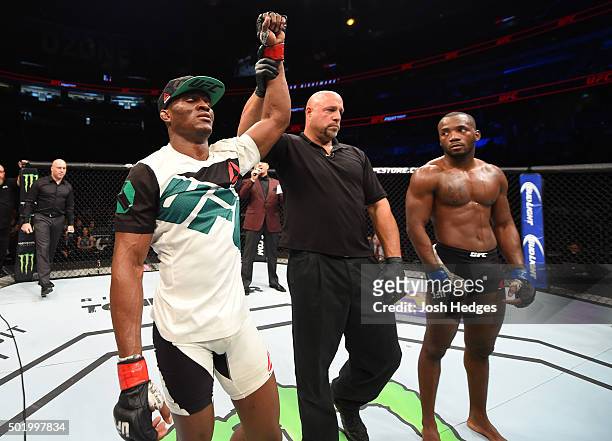 Kamaru Usman celebrates his victory over Leon Edwards in their welterweight bout during the UFC Fight Night event at the Amway Center on December 19,...