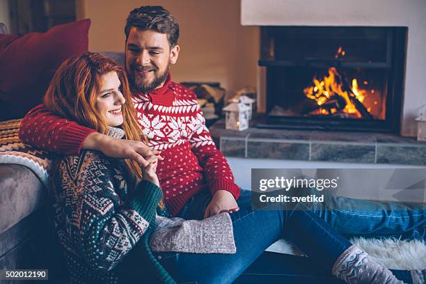 cozy mountains hlidays. - socks fireplace stock pictures, royalty-free photos & images