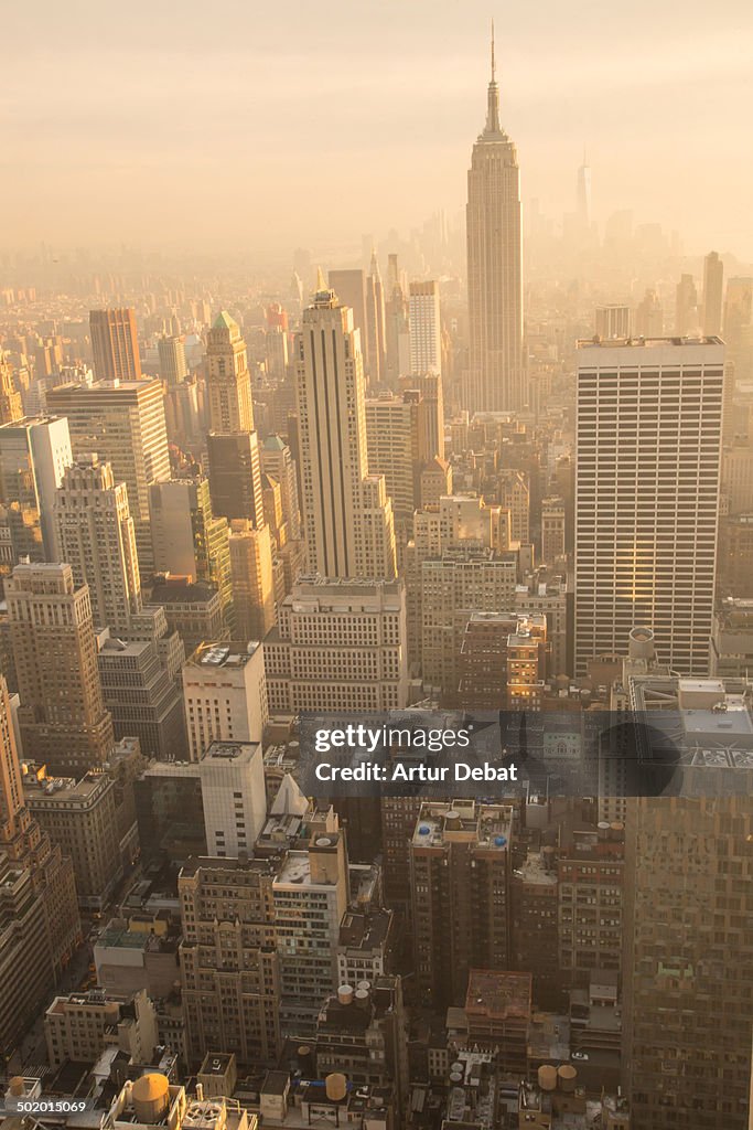 Empire State with Manhattan view at sunet.