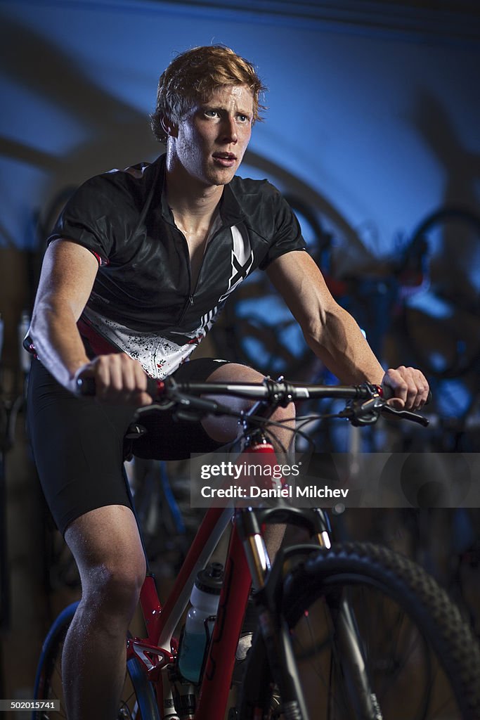 Indoor biker working out.