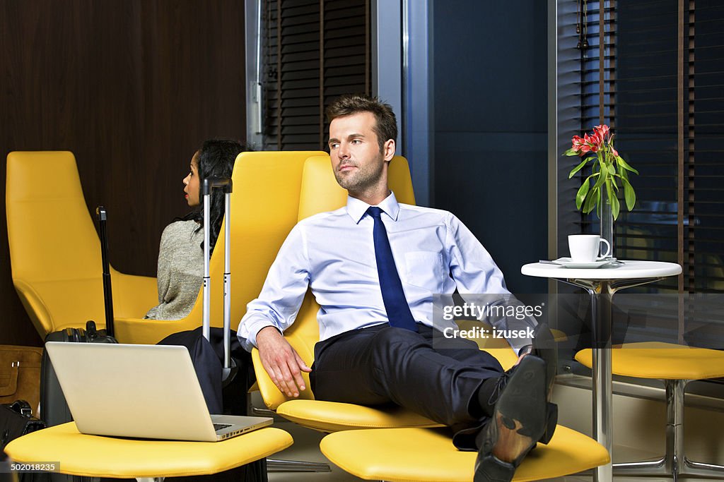 Businessman waiting for the flight