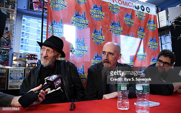 Frank Miller, Brian Azzerello and Andy Kubert attend Dark Knight III: The Master Race signing at Midtown Comics on December 19, 2015 in New York City.
