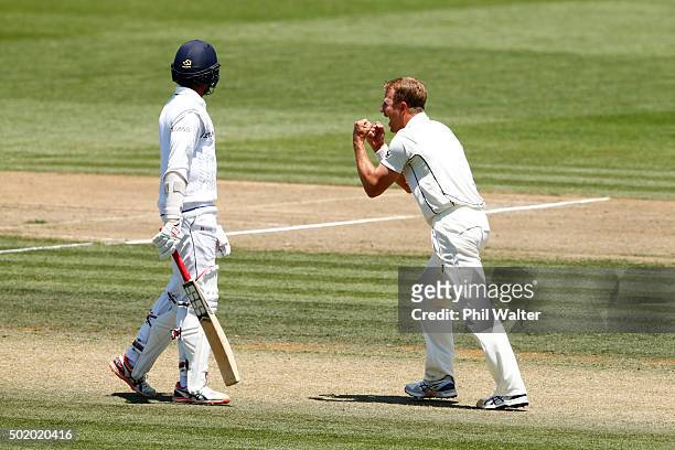 Neil Wagner of New Zealand celebrates his wicket of Kithuruwan Vithanage of Sri Lanka during day three of the Second Test match between New Zealand...