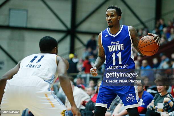 Brandon Jennings of the Grand Rapids Drive looks to pass the ball against Lazeric Jones of the Iowa Energy during the second half of an NBA D-League...