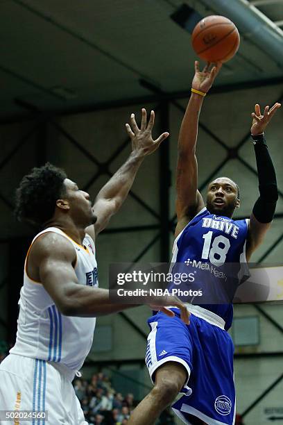 Kammeon Holsey of the Grand Rapids Drive shoots against Alex Stepheson of the Iowa Energy during the second half of an NBA D-League game on December...