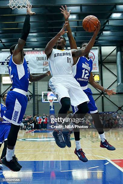 Lazeric Jones of the Iowa Energy goes to the basket against Xavier Ford of the Grand Rapids Drive during the second half of an NBA D-League game on...