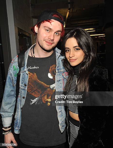 Michael Clifford and Camila Cabello pose backstage during 93.3 FLZ's Jingle Ball 2015 Presented by Capital One at Amalie Arena on December 19, 2015...