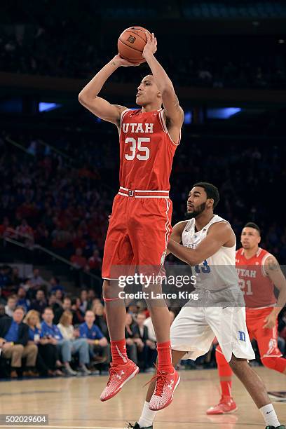 Kyle Kuzma of the Utah Utes puts up a shot against the Duke Blue Devils during the Ameritas Insurance Classic at Madison Square Garden on December...