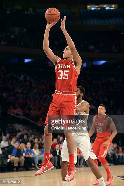 Kyle Kuzma of the Utah Utes puts up a shot against the Duke Blue Devils during the Ameritas Insurance Classic at Madison Square Garden on December...
