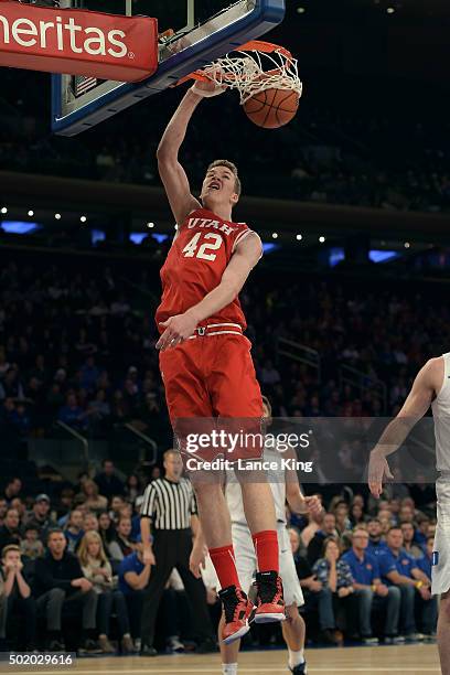 Jakob Poeltl of the Utah Utes dunks against the Duke Blue Devils during the Ameritas Insurance Classic at Madison Square Garden on December 19, 2015...