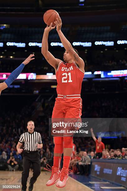 Jordan Loveridge of the Utah Utes puts up a shot against the Duke Blue Devils during the Ameritas Insurance Classic at Madison Square Garden on...