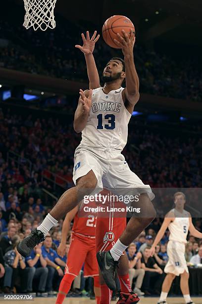 Matt Jones of the Duke Blue Devils goes to the basket against the Utah Utes during the Ameritas Insurance Classic at Madison Square Garden on...