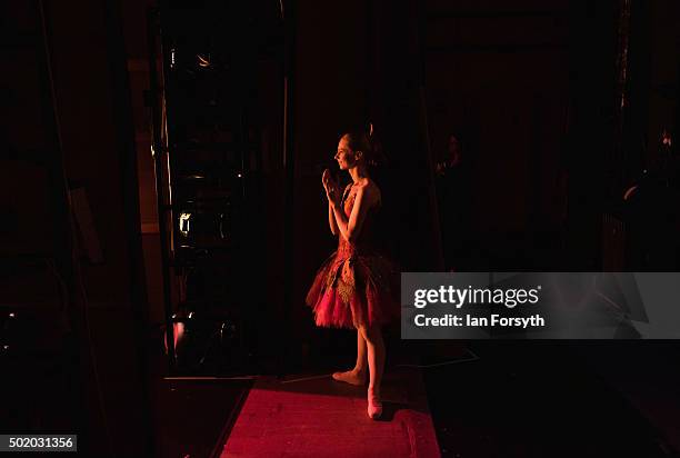 Northern Ballet dancer Isabelle Clough looks on and applauds from the wings during the final scenes of The Nutcracker at the Grand Theatre on...