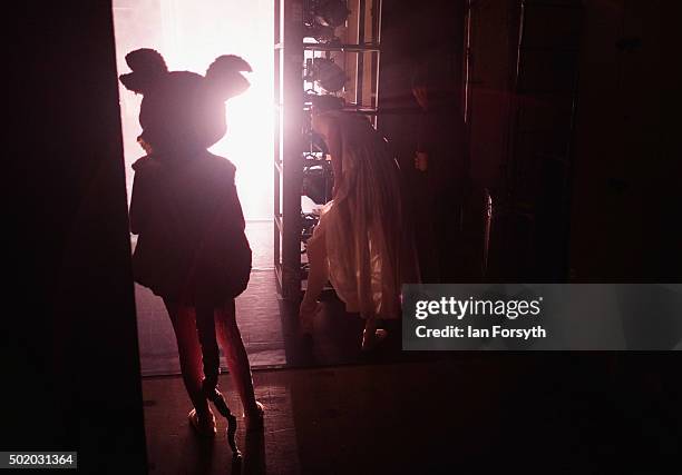 Dancer dressed as a mouse waits in the wings during a performance of The Nutcracker by Northern Ballet at the Grand Theatre on December 18, 2015 in...