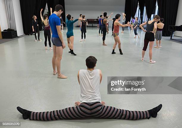 Ballet dancers stretch and practice during company class at the headquarters of Northern Ballet ahead of a performance later that evening of The...