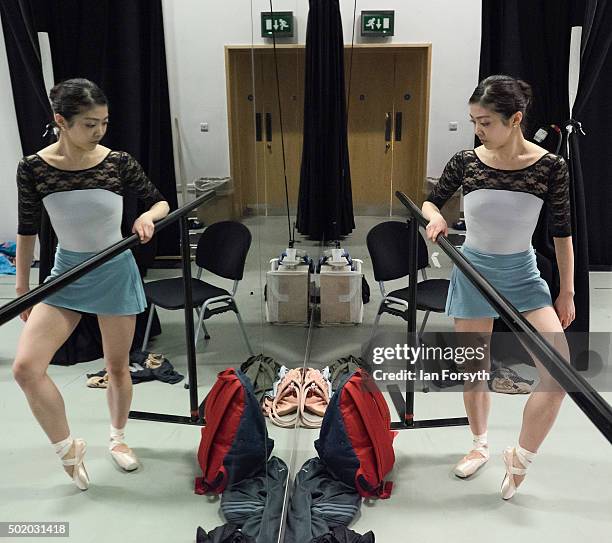 Ballet dancer Ayami Miyata practices at the barre during company class at the headquarters of Northern Ballet ahead of a performance later that...
