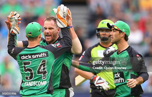 John Hastings of the Stars is congratulated by team mates after taking the wicket of Jacques Kallis of the Thunder during the Big Bash League match...