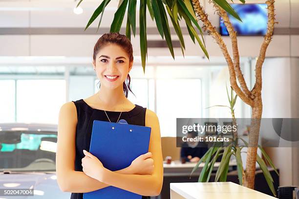 car saleswoman - secretary stock pictures, royalty-free photos & images