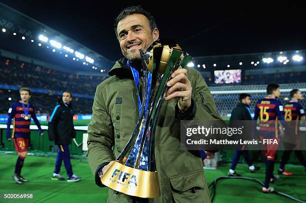 Luis Enrique, manager of Barcelona pictured with the trophy after the FIFA Club World Cup Final match between River Plate and FC Barcelona at...